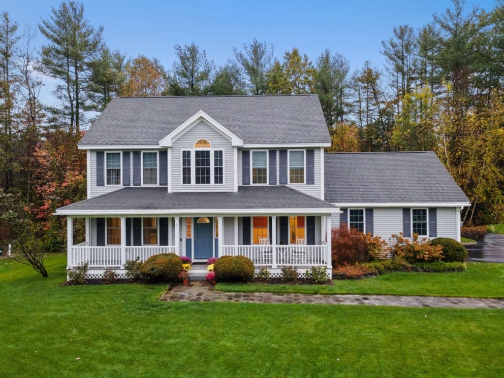 house with autumnal trees